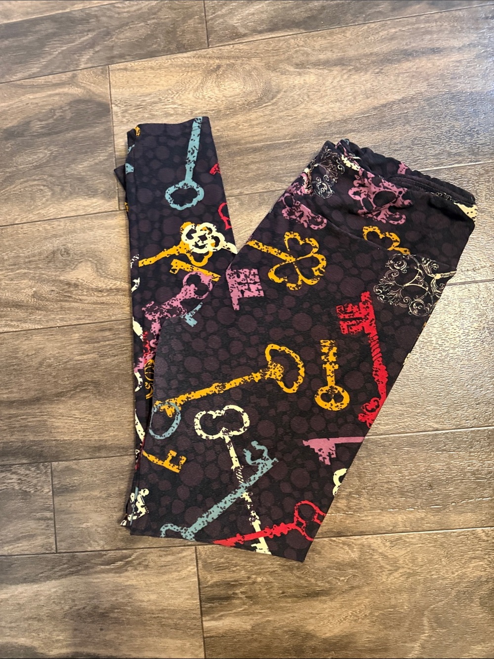 LuLaRoe Black Leggings with Multicolor Key Print